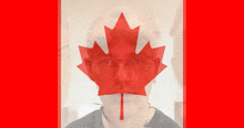 a man with glasses and a maple leaf behind his face