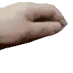 a close up of a person 's hand with their fingers crossed .