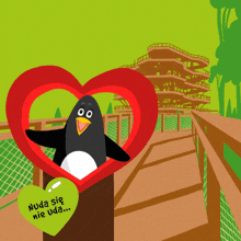 a penguin in a heart with a sign that says nuda się nie uda