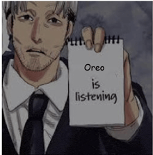 a man in a suit and tie is holding a piece of paper that says `` oreo is listening '' .