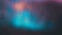 a blurred image of a blue and pink colored background