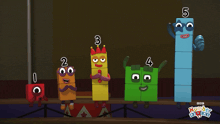 a group of number blocks are standing on a stage