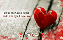 a picture of a red heart with tara written below it