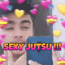 a man is taking a picture of himself with the words sexy jutsu !!! above him