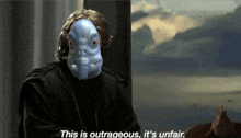 a man with a blue mask on his face says this is outrageous it 's unfair