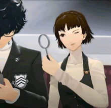 a woman holding a magnifying glass next to a man with a shield on his jacket that says ' tokyo ghoul '