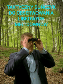 a man in a suit is looking through binoculars in a forest with the words taktyczny dunczyk do obserwowania libkowych metdownow