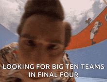 a man is looking for big ten teams in the final four