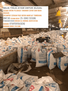 a warehouse filled with bags of baja tinja ayam for sale