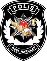 a black and white emblem that says polis özel harekat