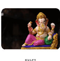 a statue of ganesha is sitting on a couch with the word kulfy below it