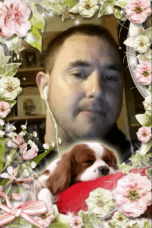 a picture of a man and a dog in a flower frame