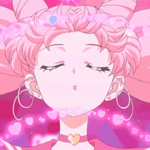 a close up of a girl with pink hair and hearts around her head