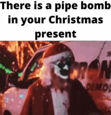 there is a pipe bomb in your christmas present with a picture of a clown in a santa suit .