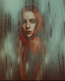 a woman with red hair is behind a window with condensation on it