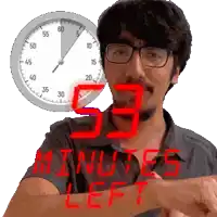a man wearing glasses stands in front of a clock that says 53 minutes left on it
