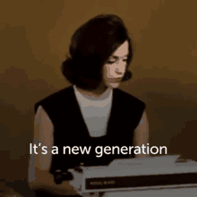 a woman sitting at a typewriter with the words " it 's a new generation " written below her