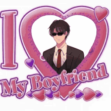 a man in a suit and tie stands in front of a heart that says i love my boyfriend