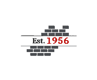 a brick wall with the year 1956 in red letters