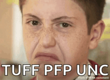 a young boy making a funny face with the words tuff pfp unc on the bottom