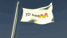 a white flag that says td bad with emojis on it