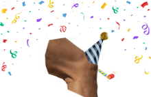 a person wearing a party hat with confetti falling around them