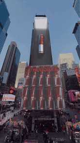 a tall building with redstone written on the side