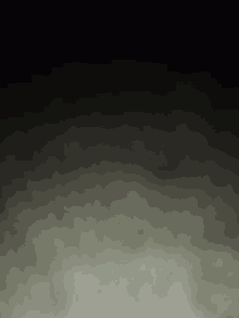 there is a lot of smoke coming out of the bottom of the screen on a black background .