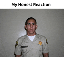 a man in a sheriff 's uniform stands in front of a wall with the caption my honest reaction