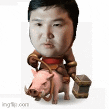 a man is riding a pig with a hammer in his hand .