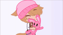 a girl in a pink hat is hugging a pink bunny