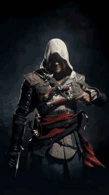 a man in a hood is holding a sword