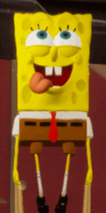 spongebob is sticking his tongue out and smiling