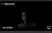 a person 's face is visible in the dark with the words general and namedata on the bottom