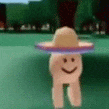 a person wearing a sombrero with a smiley face on it .