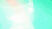a close up of a person 's arm with a green glow