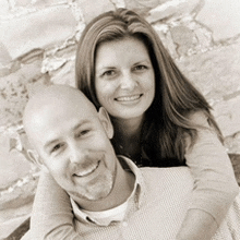 a man and a woman are posing for a picture together