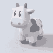 a cartoon cow with black spots on its body