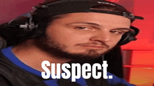 a man wearing headphones and a hat has the word suspect written on his face