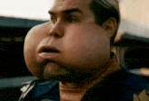 a close up of a man 's face with a huge nose