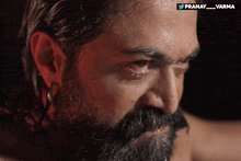 a close up of a man 's face with the hashtag pranay_varma above him