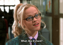 a woman wearing glasses and a tie says " what , like it 's hard "