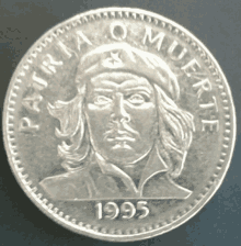 a silver coin with a picture of che guevara on it