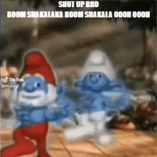 a couple of smurfs are dancing together in a cartoon scene .