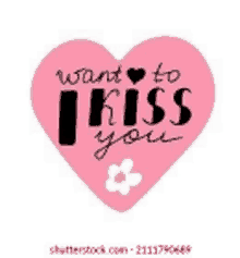 a pink heart with the words `` i want to kiss you '' and a flower on it .