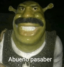 a shrek statue with a mustache is smiling and says abueno pasarer .