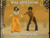 a man and a woman are dancing on a stage and the man is saying `` rise and shine ... good morning ! ''