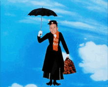 a man is dressed as mary poppins holding an umbrella and a bag