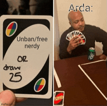 a man is holding a uno card next to a table with cards on it .