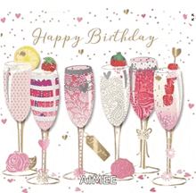 a birthday card with champagne glasses and the name aimee on the bottom